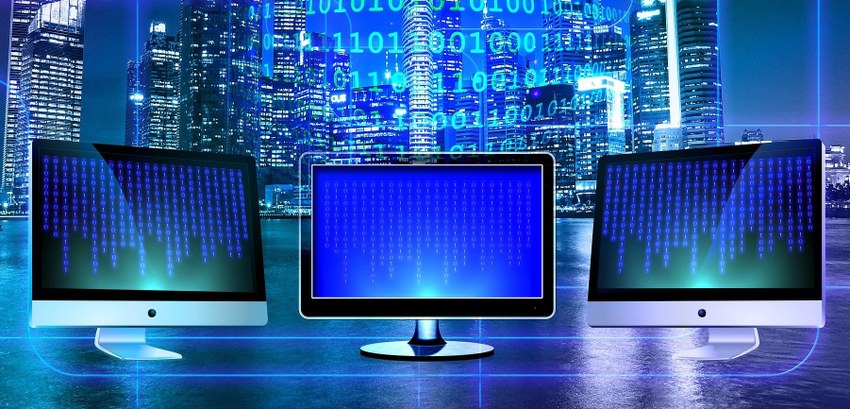 TRE-RJ monitores de computador Três monitores de computador, um do lado do outro, com a tela cheia dos números o e 1 dispostos ...